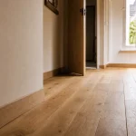 Sens parquet couloir : pose en longueur, parquet chêne dans un couloir